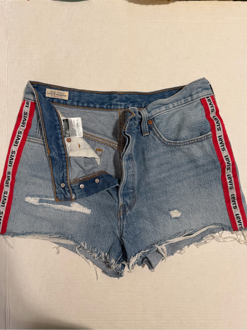 Levi's Light Blue Denim Cutoff Shorts with Red Side Tape